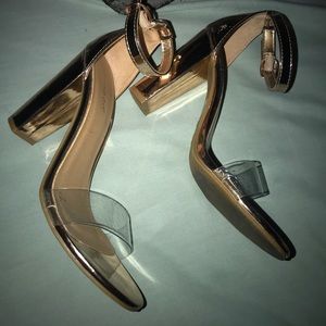Gold block heels with clear front strap . SO CUTE